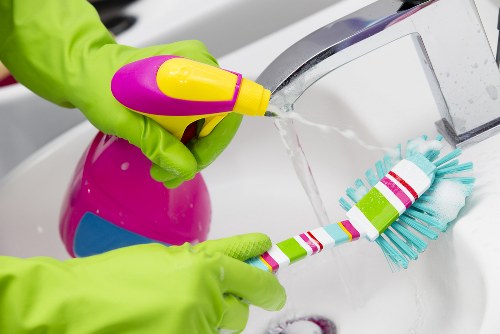 Carpet cleaning staff following safe workplace practices